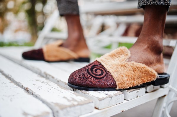 Discover stylish versace slippers for men: a perfect fit await!